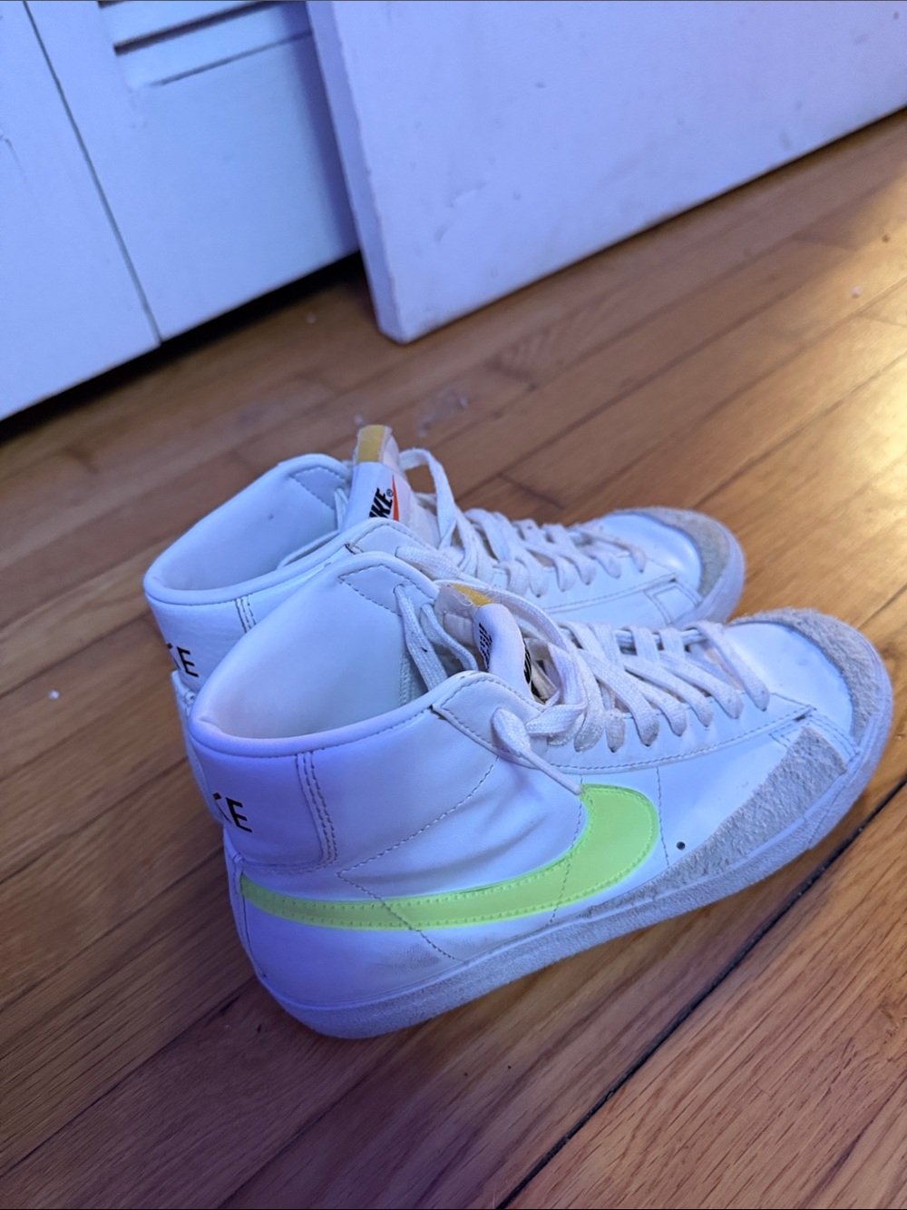 Nike High-Top Sneakers in White with Neon Yellow Swoosh